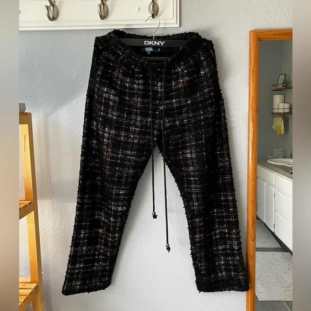 Black trousers with gold and silver thread detailing. Textured trousers. Fancy!